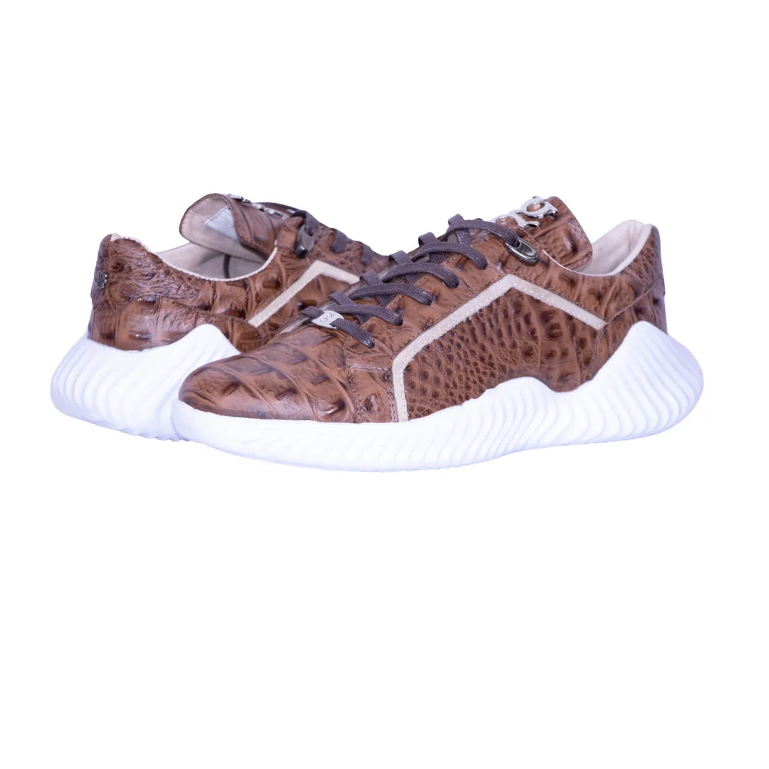 Tenis cuero cafe con textura suela blanca